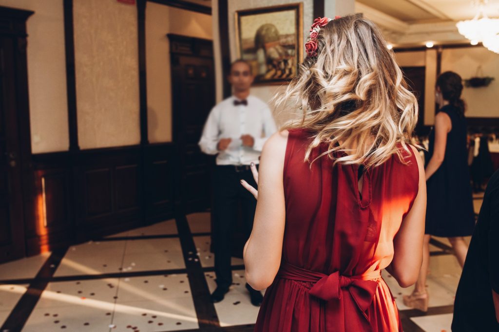 people dancing having fun at wedding party reception